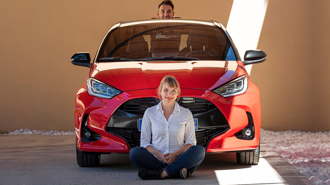 Julie Schwieder in front of Toyota Yaris